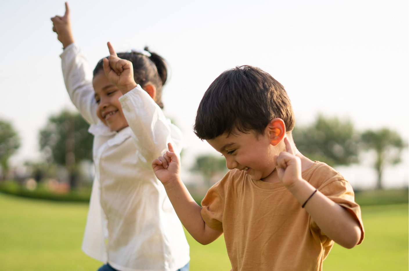 Happy children celebrating success in ABA therapy programs