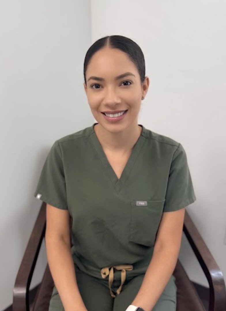 Jackelyn "Jacky" Ramirez-Kemp, M.A., BCBA, LBA, Owner & Clinical Director, smiling in her office at our Frisco center